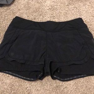 Athleta black shorts with built in biker shorts